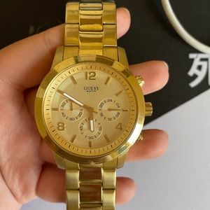 GUESS gold stainless steel watch 43mm, unisex. Watch needs battery
